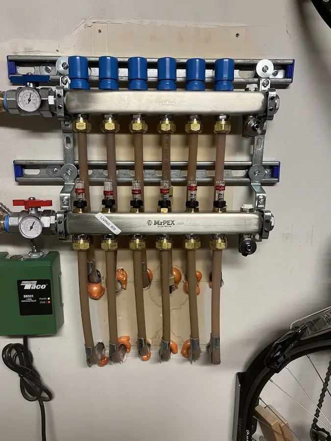 Plumber performing Water Heater Repair at a residential property in Jessup